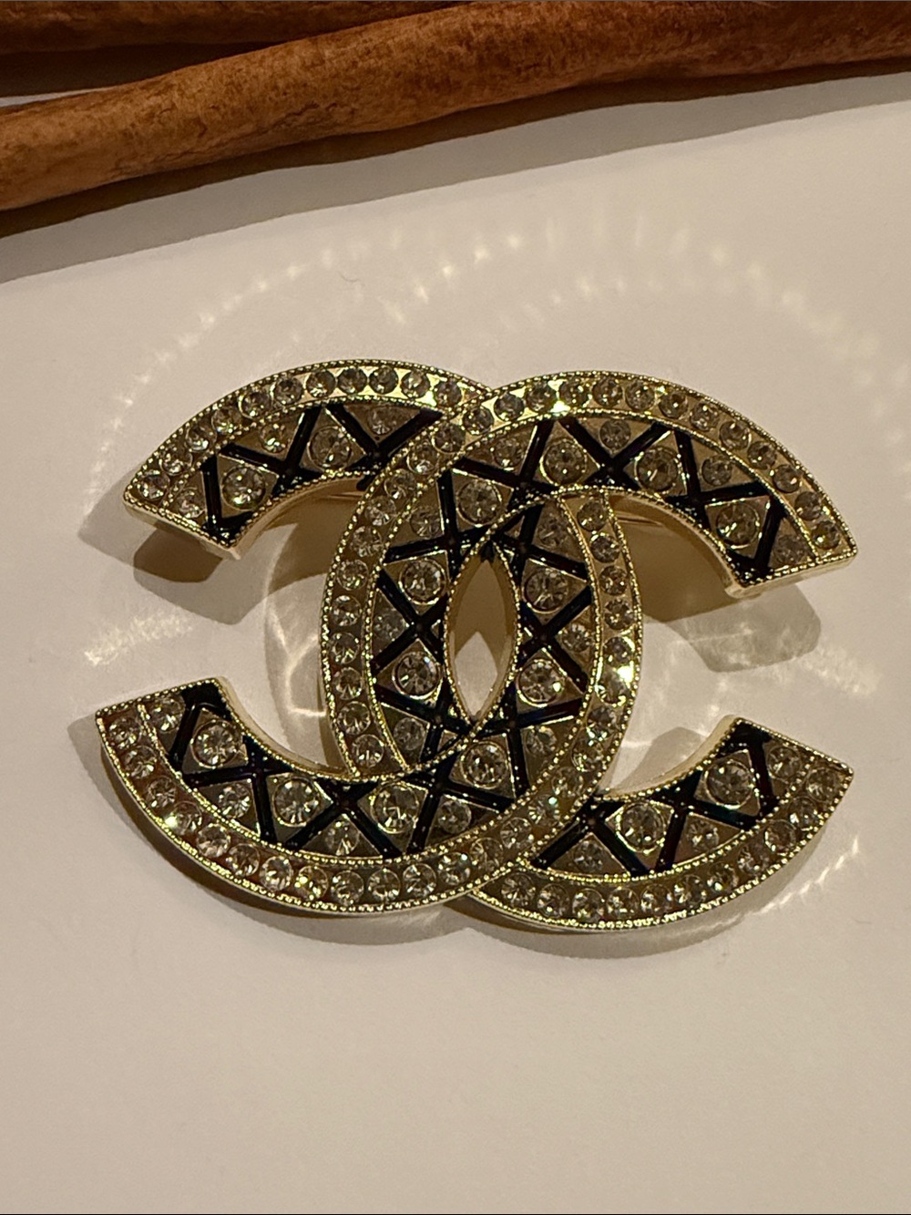 Fashion Jewelry Gold and Black Crystal Interlocking Logo Brooch